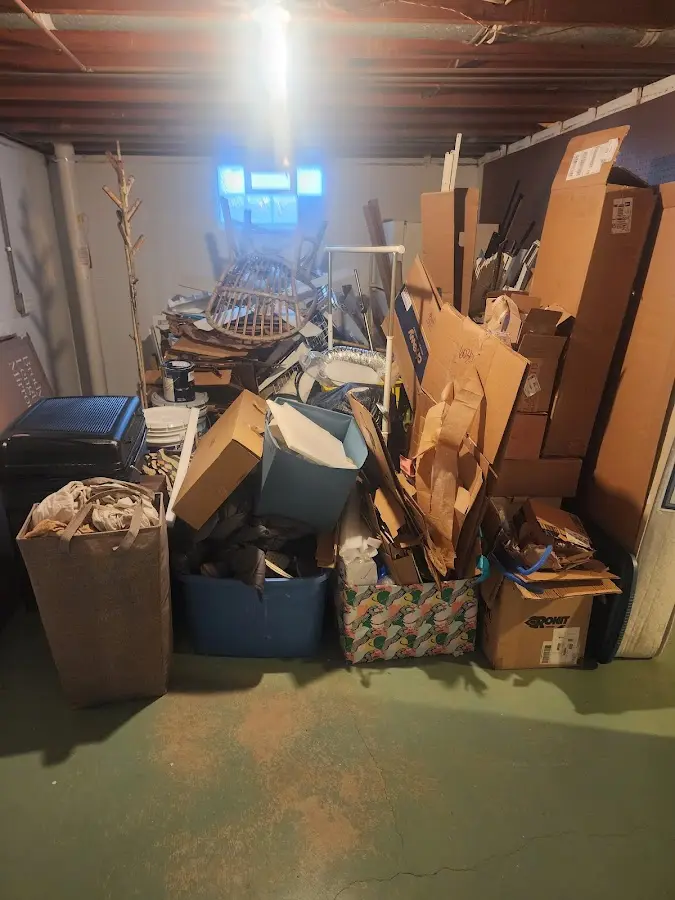 Roll-off dumpster container at job site for Yard Waste Dumpster Rental in Moon Lake